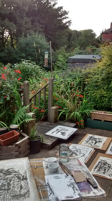 Ink painting in progress outside